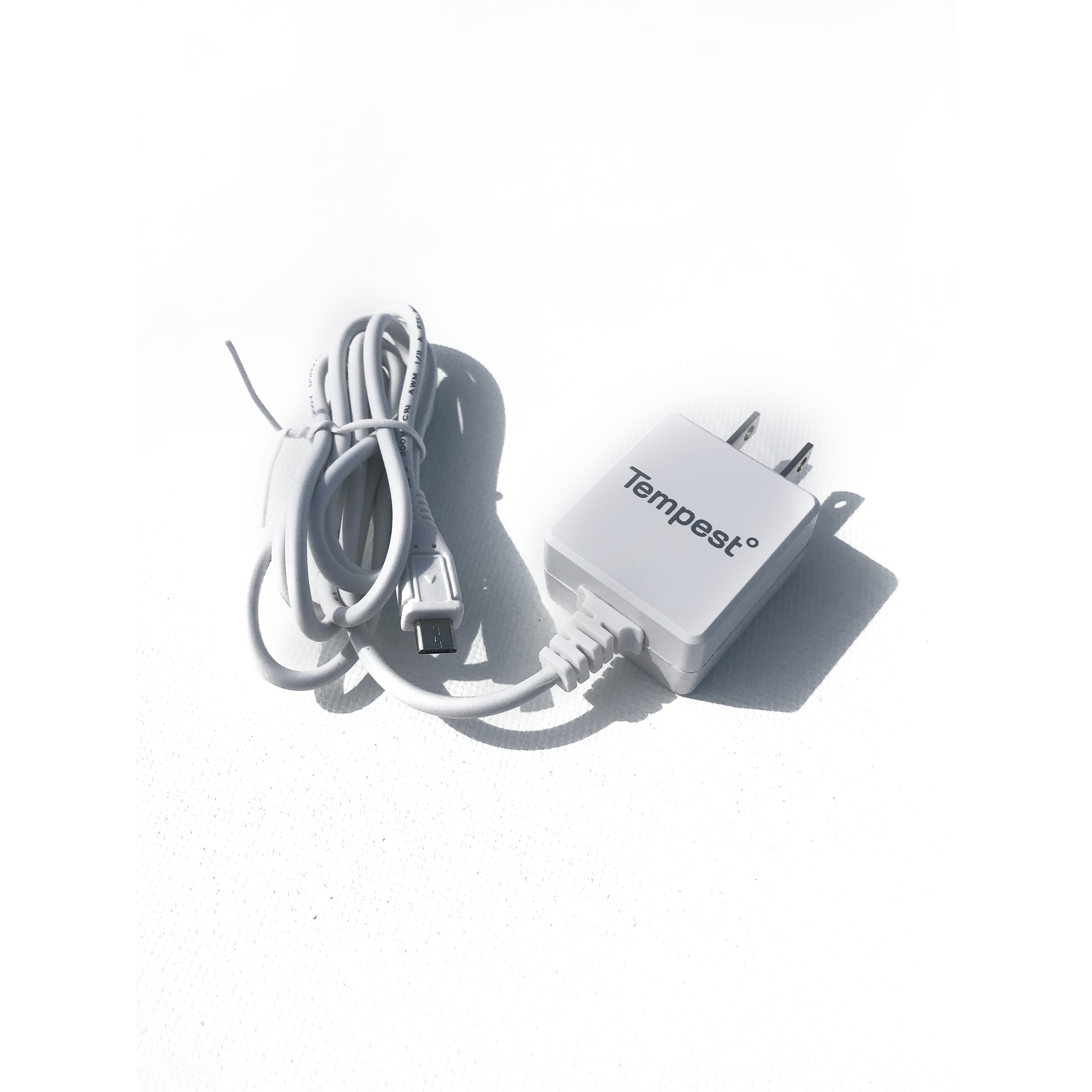 A white Tempest Weather Station power cord